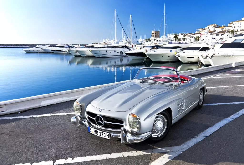 "Marbella, Spain - March, 22nd, 2012: Original Mercedes 300 SL Roadster from 1957. parked in marina Puerto Banus in Marbella, Spain. Mercedes is celebrating 60 years of SL this year, since the model was first introduced as a race car in 1952."